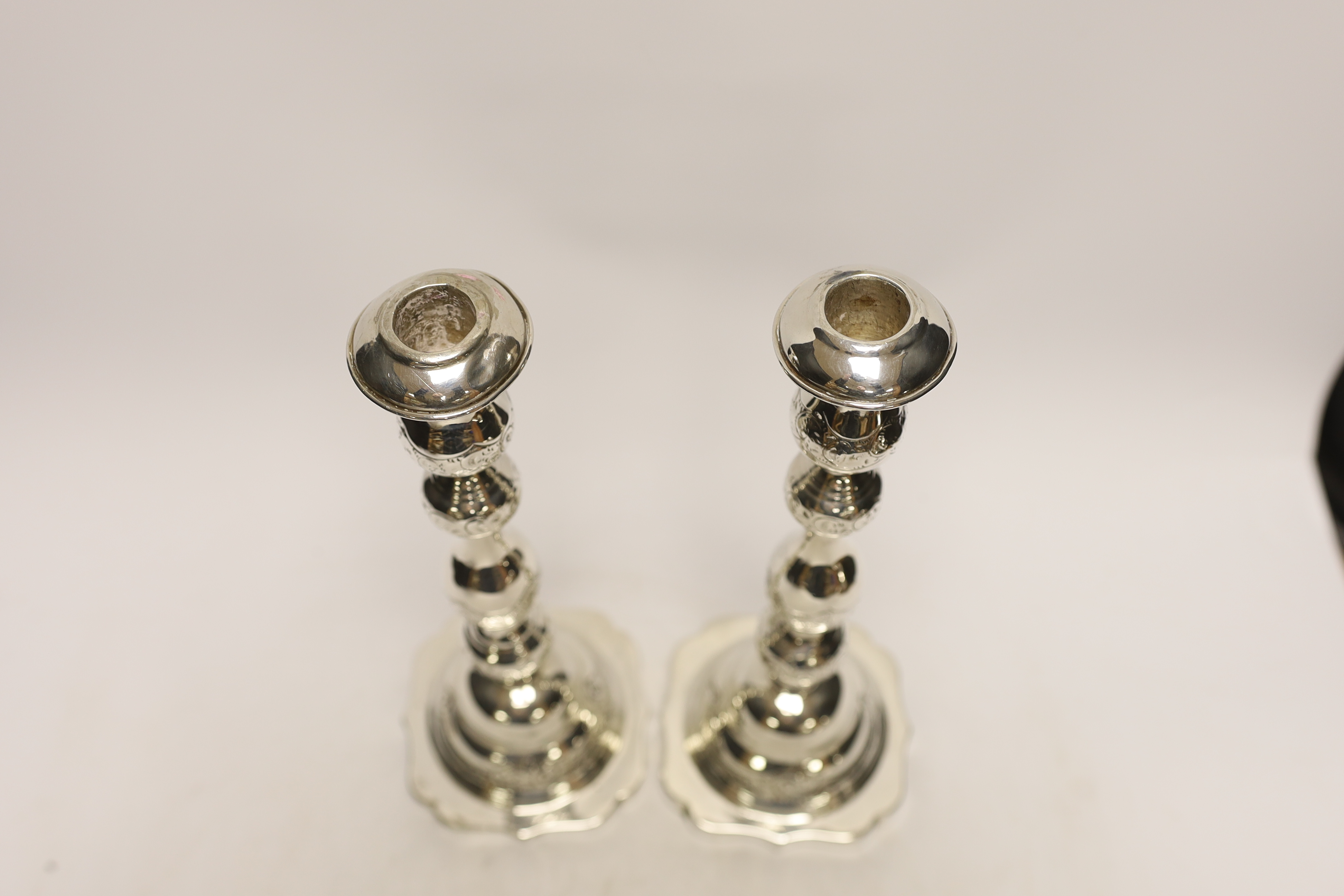 A pair of George V silver Sabbath candlesticks, by Rosenzweig, Taitelbaum & Co, London, circa 1925, marks rubbed, height 29.4cm, weighted.